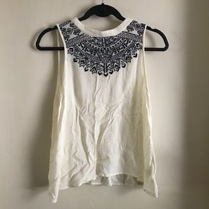 Flowy high neck tank top with black embroidery